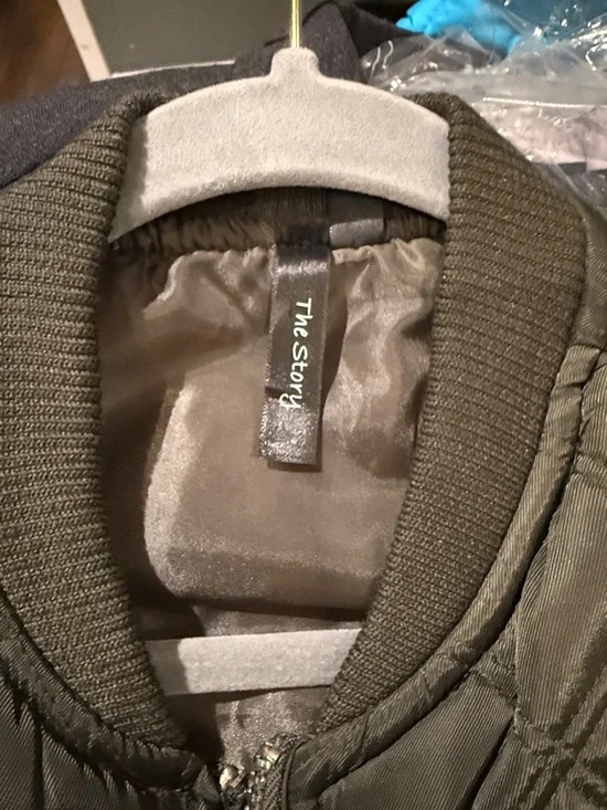 The Story Quilted Zipper Front Puffer Vest in Olive - Picture 2 of 4